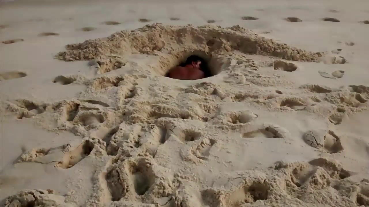buraco na praia